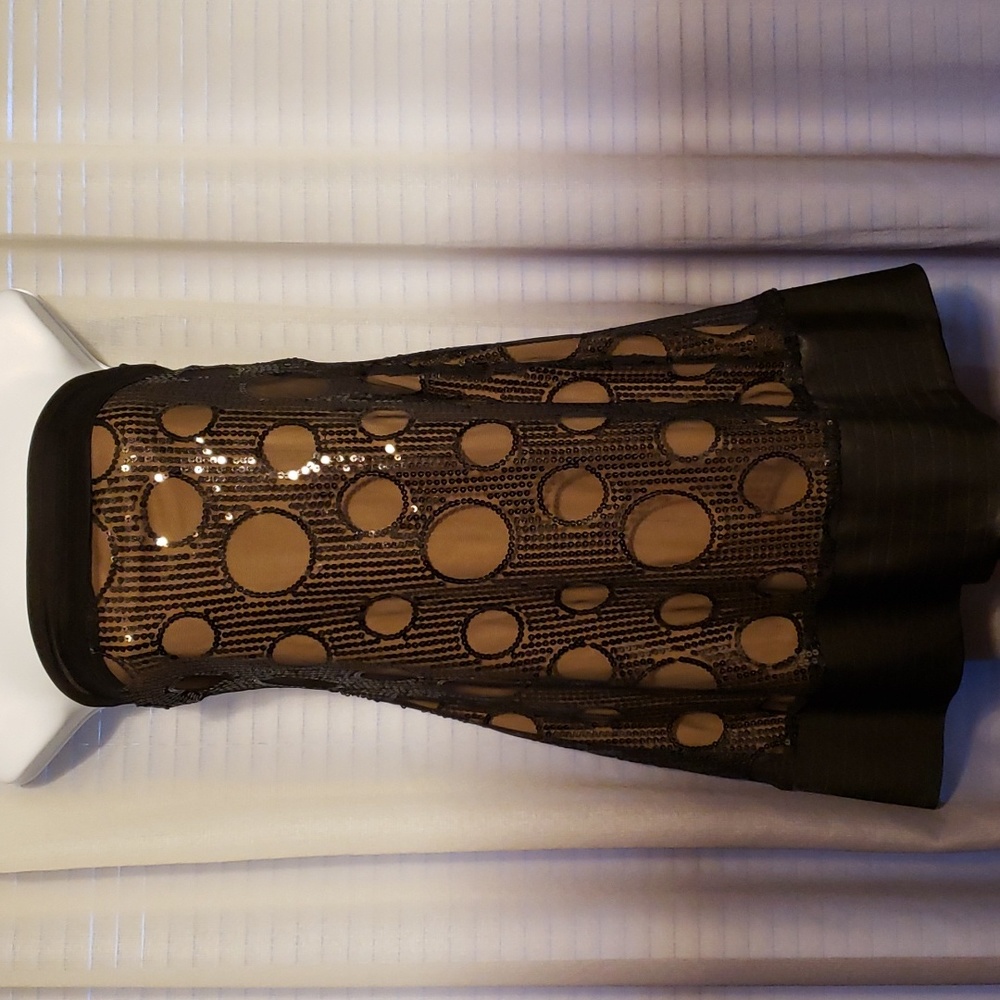 NWOT cute little black sequined dress with tan underlining